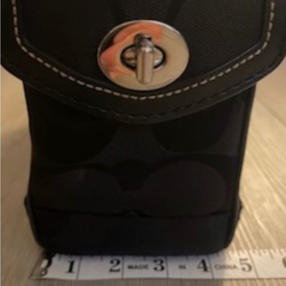 It’s a large signature C coach logo printed all over it - Picture 14 of 15